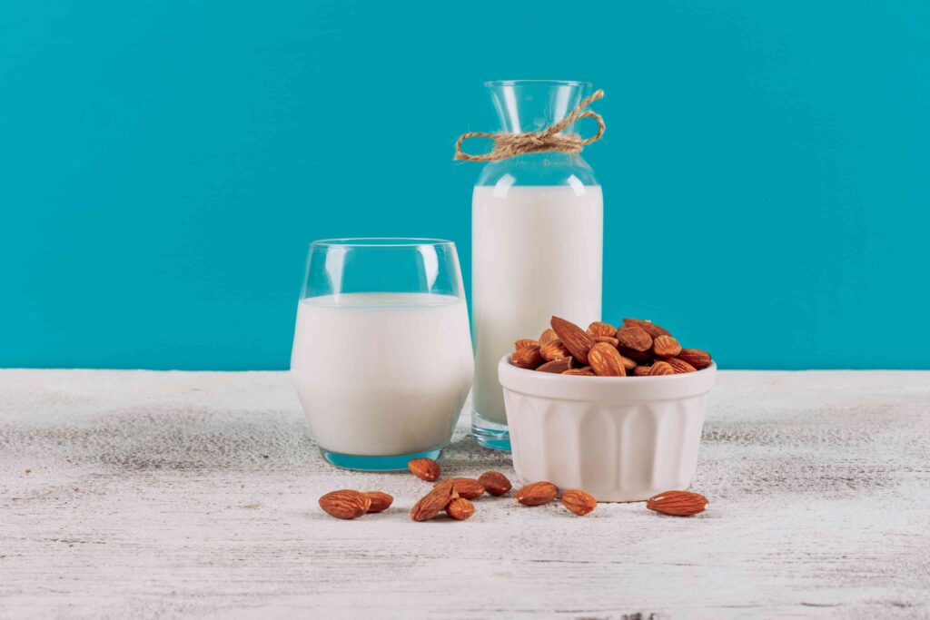 Calcium-rich foods like milk and almonds for strong bones in women over 40