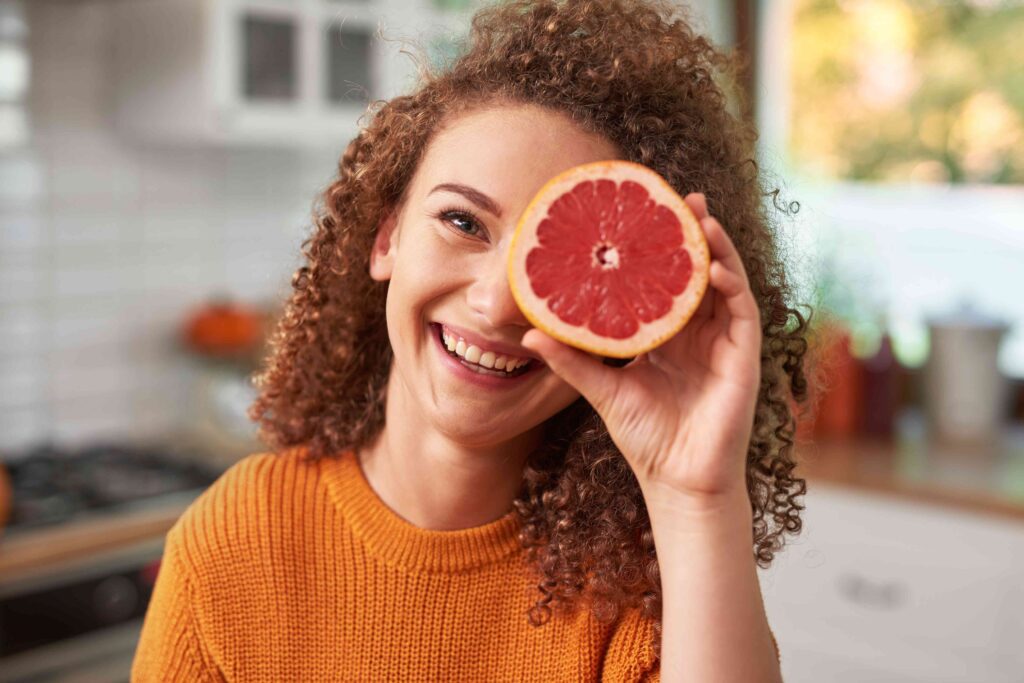 Half grapefruit on a plate for a fresh and healthy morning start